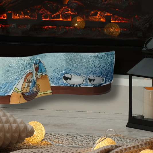 Adorno navideño de vidrio pintado a mano.